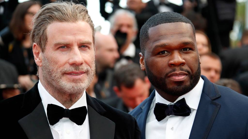 John Travolta en 50 Cent gooien samen de heupen los