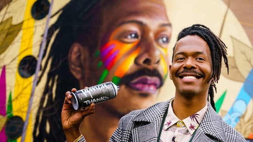 Jeangu Macrooy overweldigd door muurschildering van hem