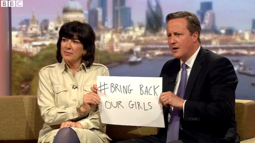 Britse premier Cameron voegt zich bij Michelle Obama