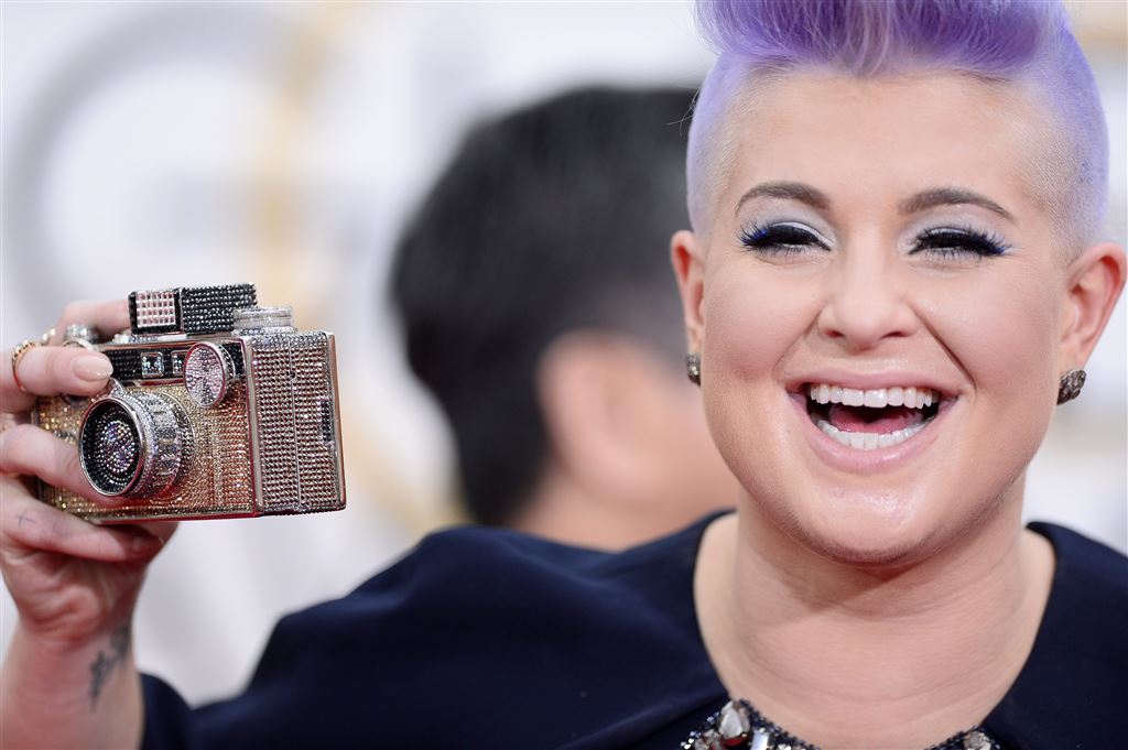 Kelly Osbourne gebeten door giftige spin