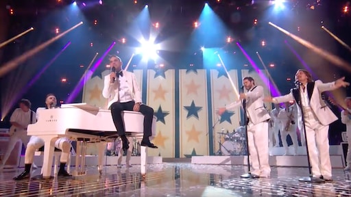 Robbie Williams weer met Take That op het podium