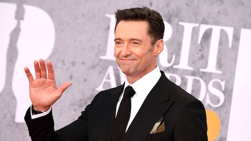 Hugh Jackman geniet van fietsrit door Amsterdam