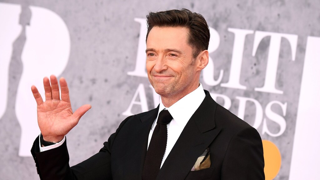 Hugh Jackman geniet van fietsrit door Amsterdam