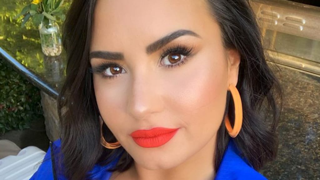 Demi Lovato laat liefdestattoo zetten