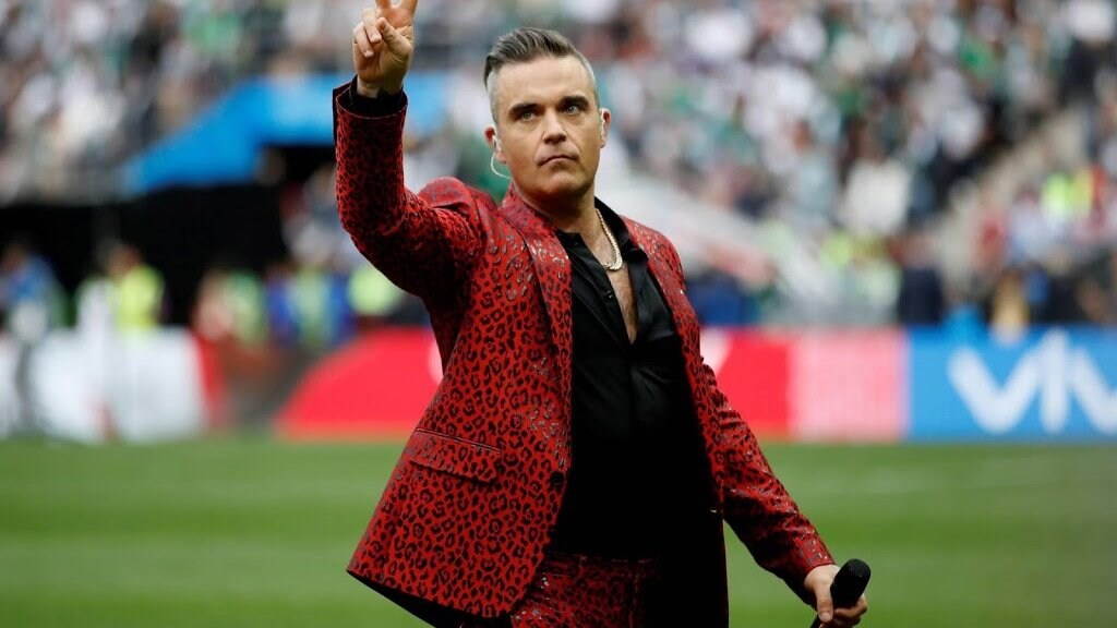 Robbie Williams steekt de draak met Justin Bieber