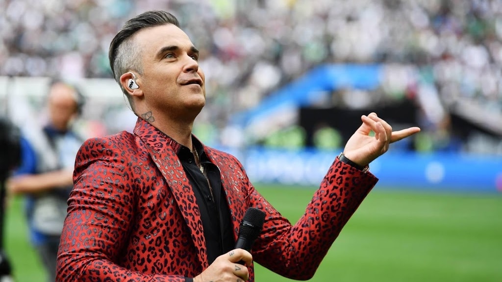 Robbie Williams: 'Symptomen corona verdwenen door te bidden'