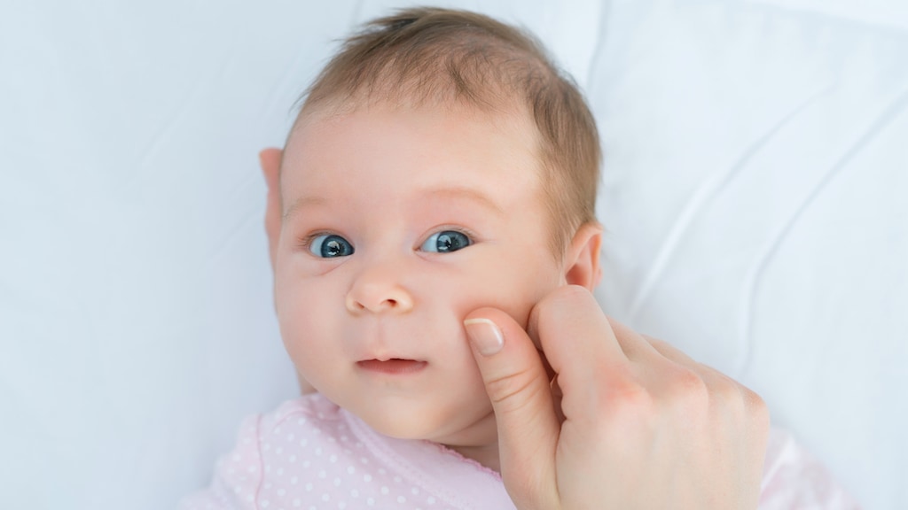 Zomaar in de wangen van een baby knijpen: de frustratie van menig ouder