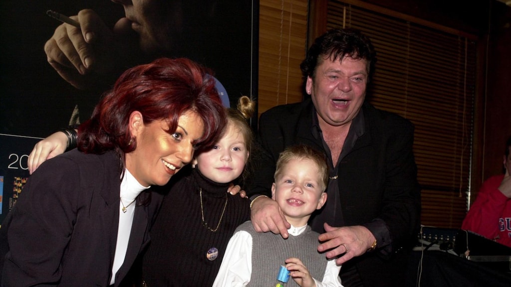 Kleine André met zijn vader, moeder en zus