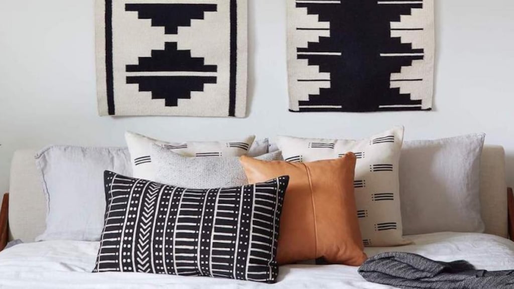 Wie durft? Een vloerkleed aan je lege muur