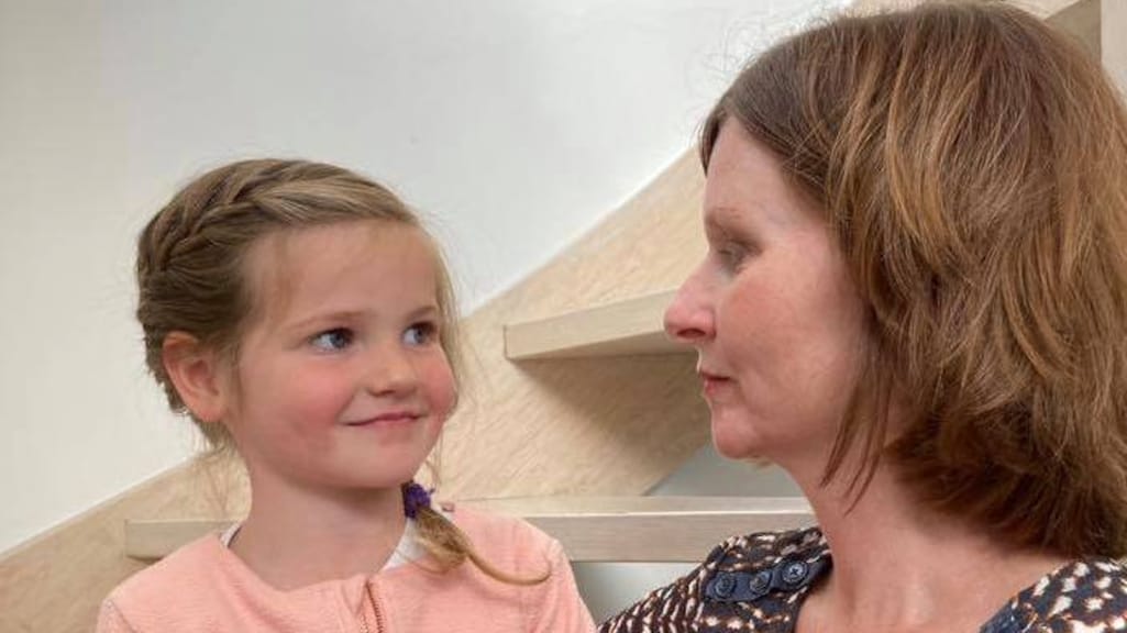 Michelle met haar 5-jarige dochter, 'inclusief koortswangen'.