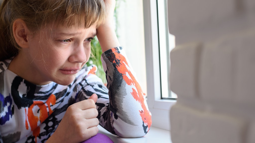 'Toen ze het geheim hoorde, barstte ze hevig geschrokken in huilen uit'