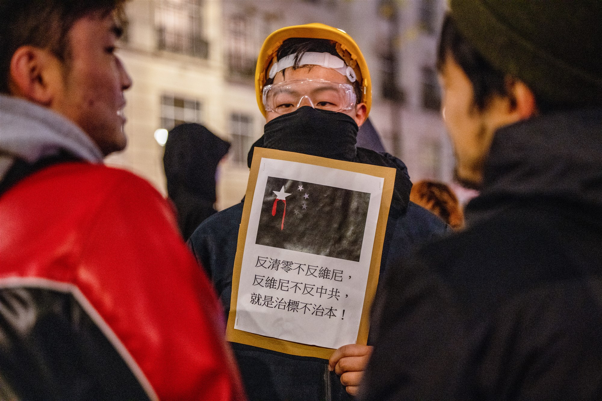 In China en op meerdere plekken in de wereld, zoals hier bij de Chinese ambassade in Londen, werd eerder deze maand gedemonstreerd tegen het Chinese (covid)beleid.