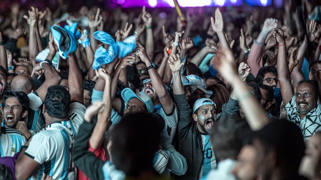 Argentijnse fans vieren op 18 december 2022 op de Lusail Boulevard de WK-winst