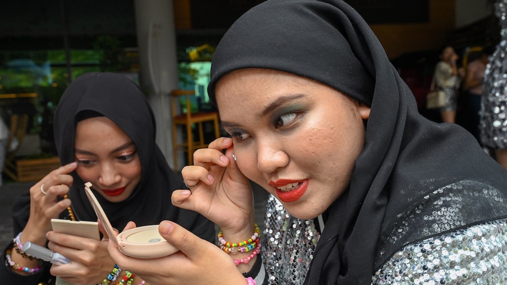 Bezoekers van het concert van Taylor Swift in Singapore.