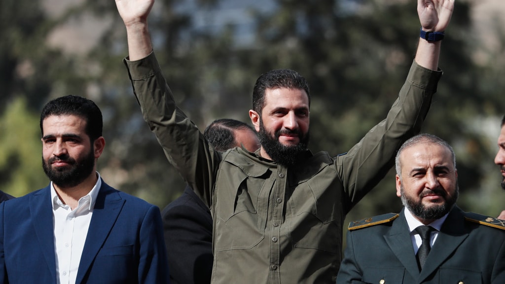 Ahmad al-Sharaa tijdens het feest in Damascus